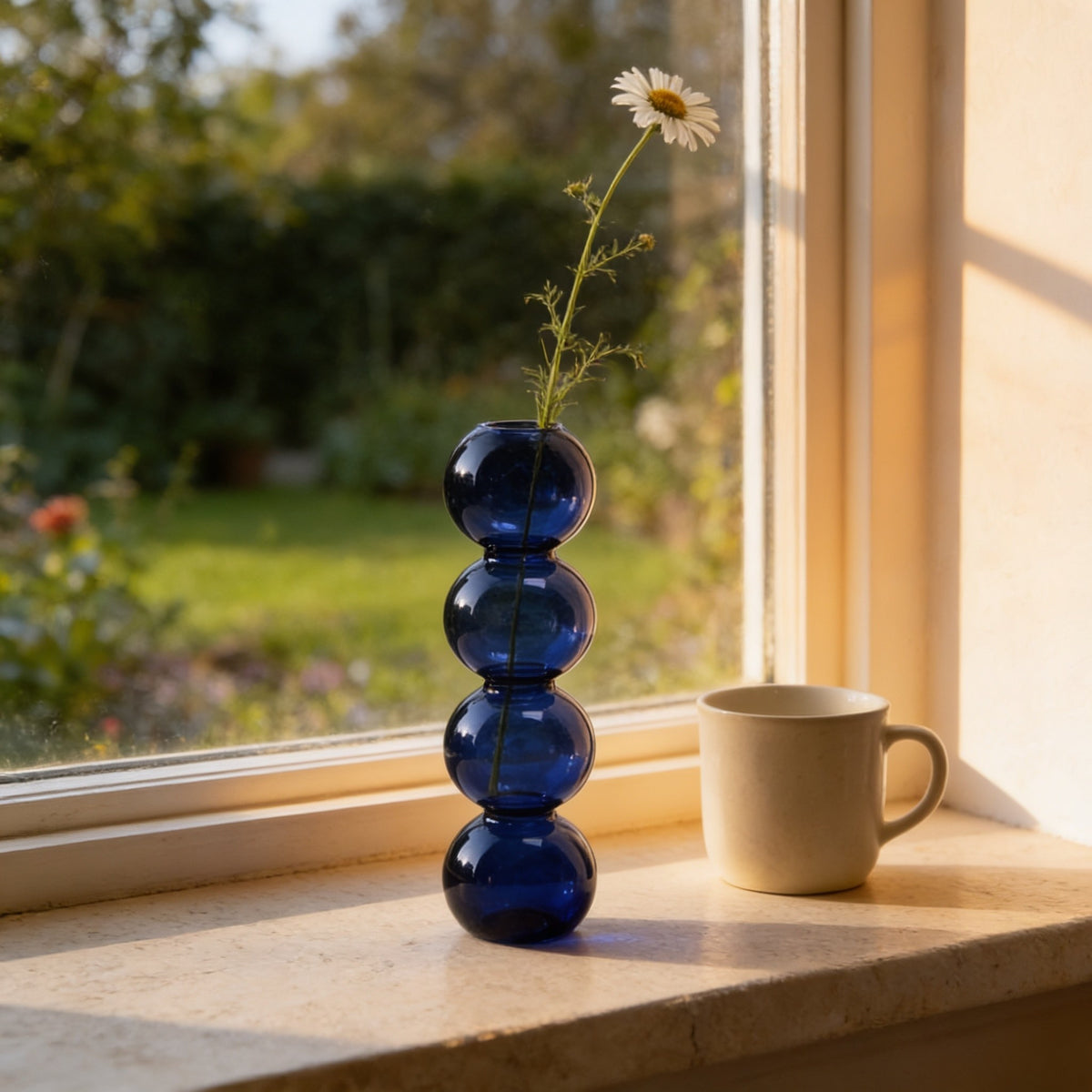 Cobalt blue large four-bubble glass vase.
