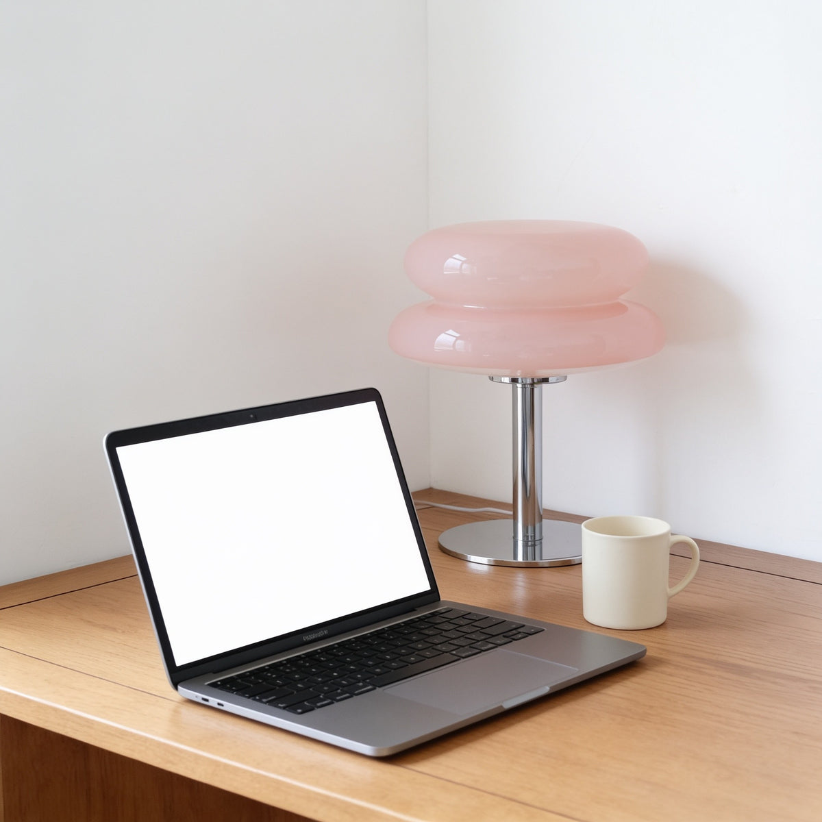 Pink two-tier glass mushroom lamp.