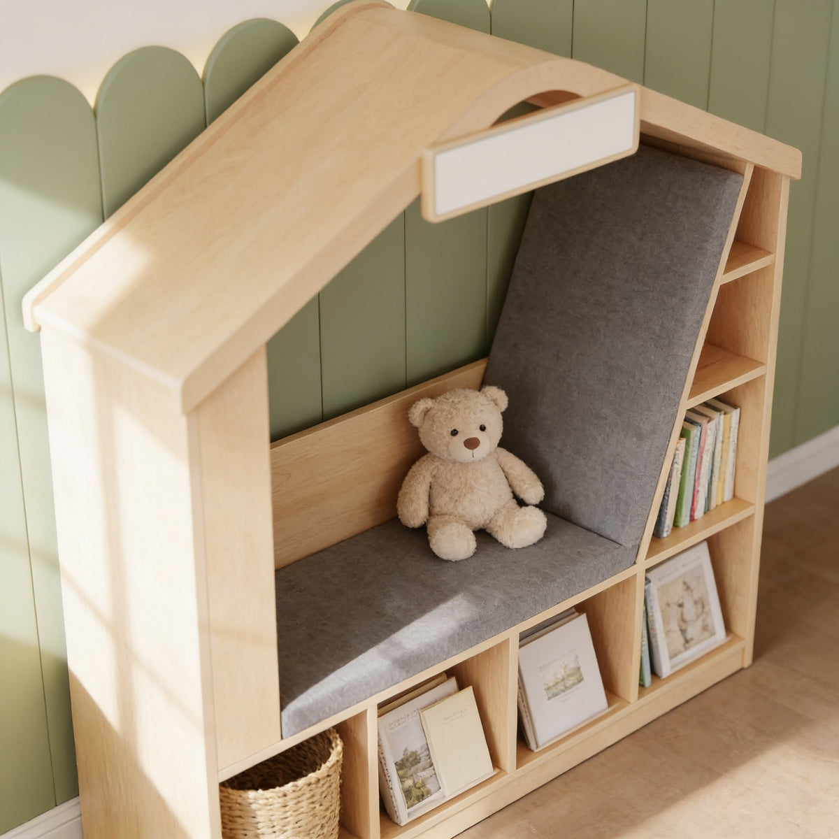 Close detail of the gray seat cushion and backrest framed by light wood-grain panels, books facing out on the side shelves.