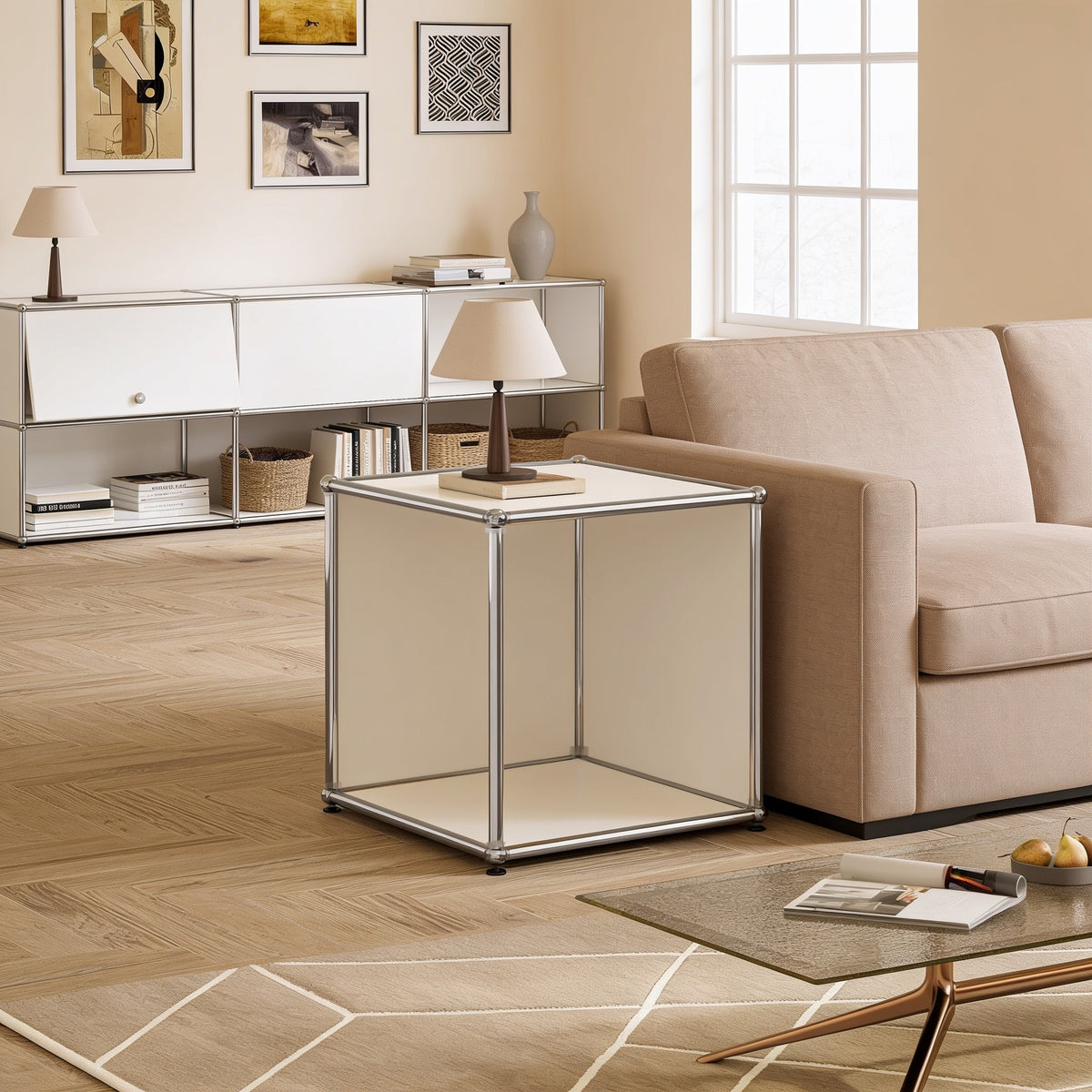 White modular metal open cube side table with chrome frame and ball connectors in a living room.