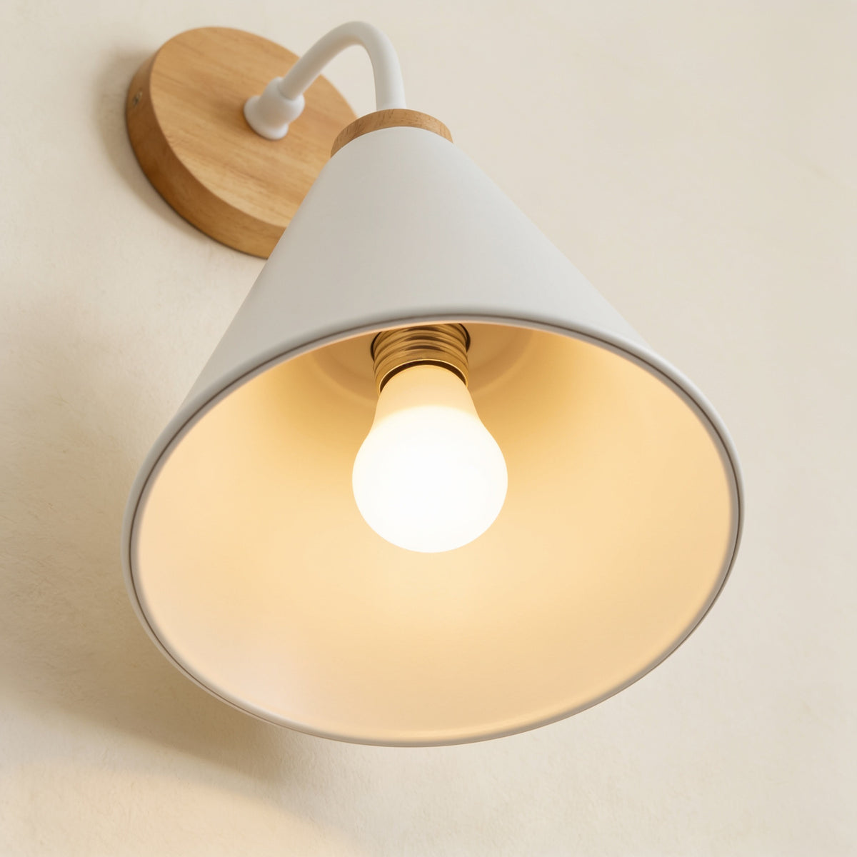 Underside of the white metal cone showing the E27 bulb — Nordic Wood & Metal Cone Wall Sconce