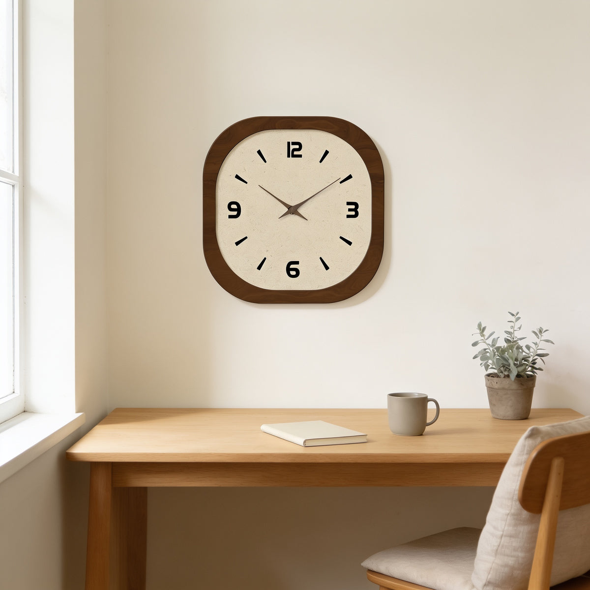 Rounded square wood wall clock above an oak desk in a home office — Rounded Square Wood Wall Clock