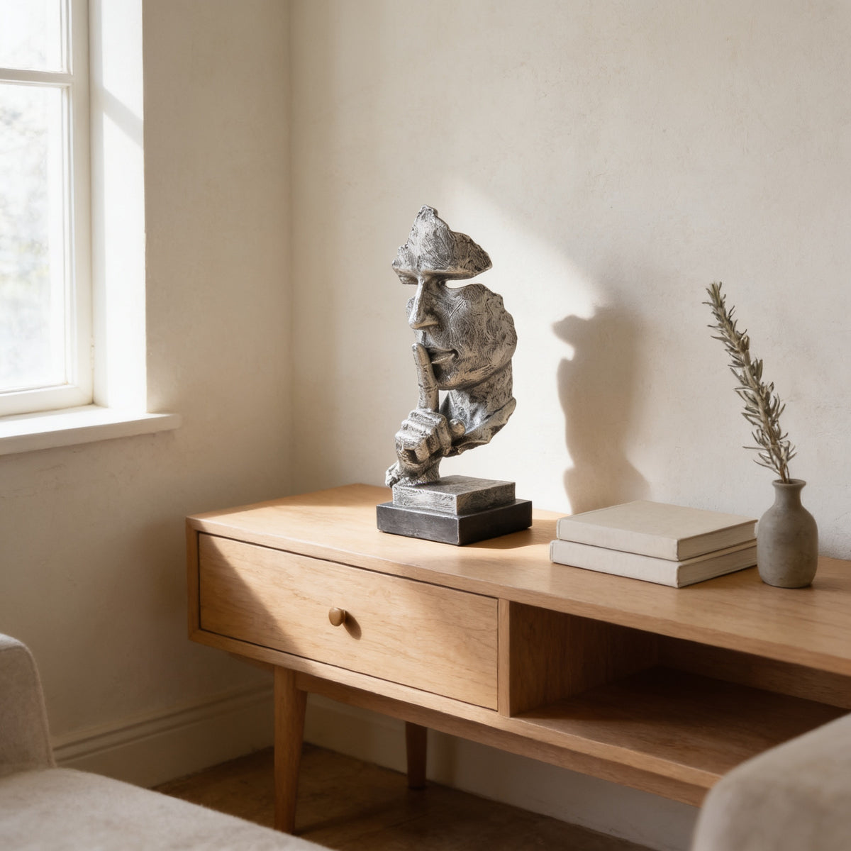 Antique silver silence thinker statue on an oak console — Silence Is Golden Thinker Statue