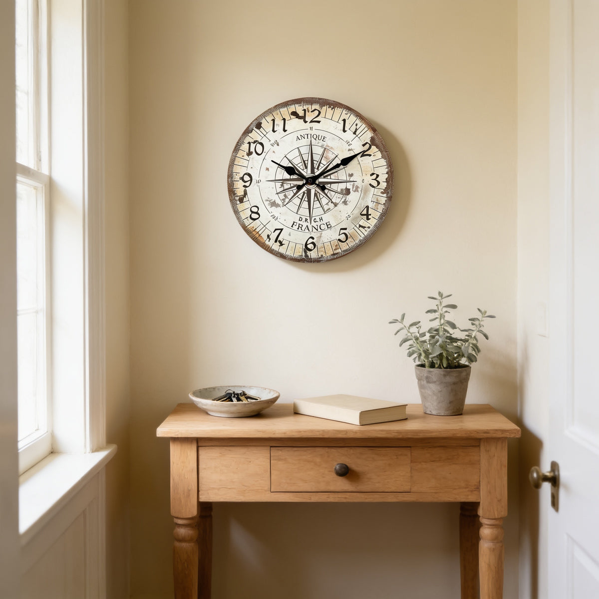 Vintage compass wall clock on a hallway wall above an oak console