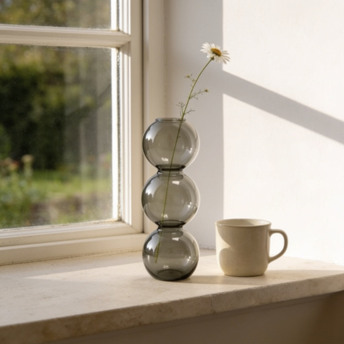 Smoke gray small three-bubble glass vase.
