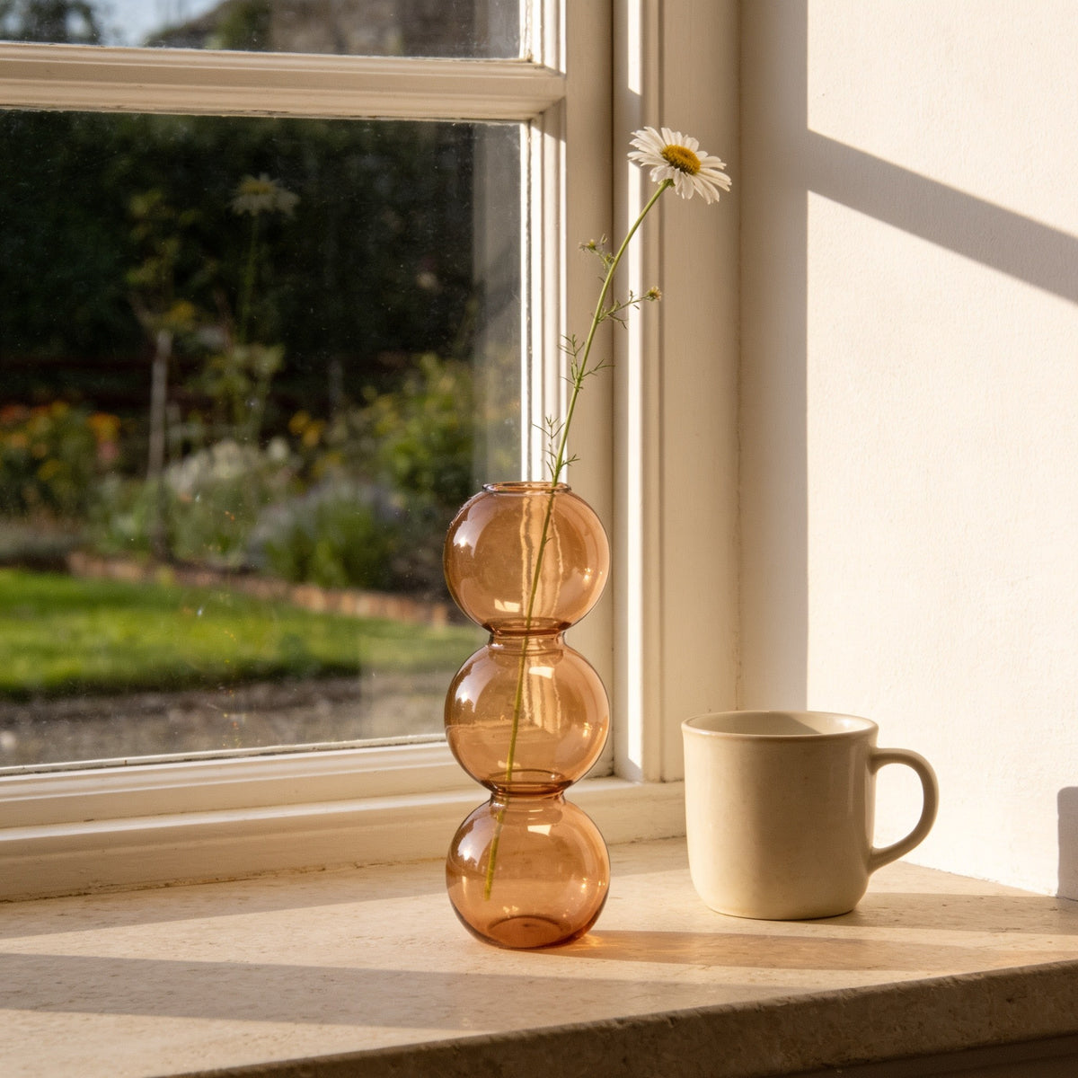 Terracotta small three-bubble glass vase.