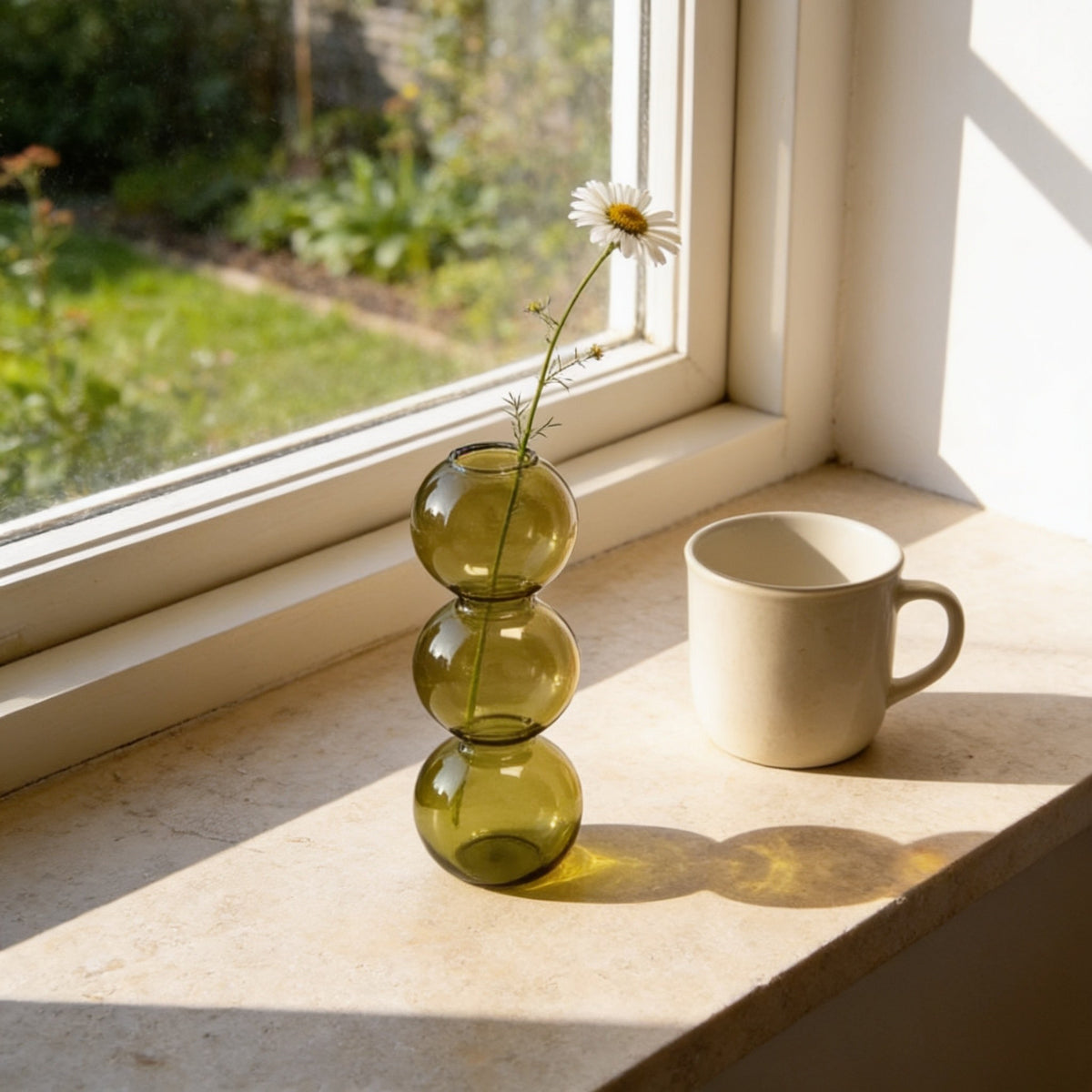 Olive green small three-bubble glass vase.