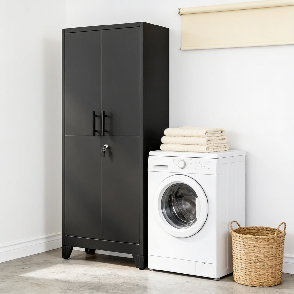 Black metal storage cabinet standing beside a white washing machine in a utility room, showing its narrow thirty-five centimetre depth.