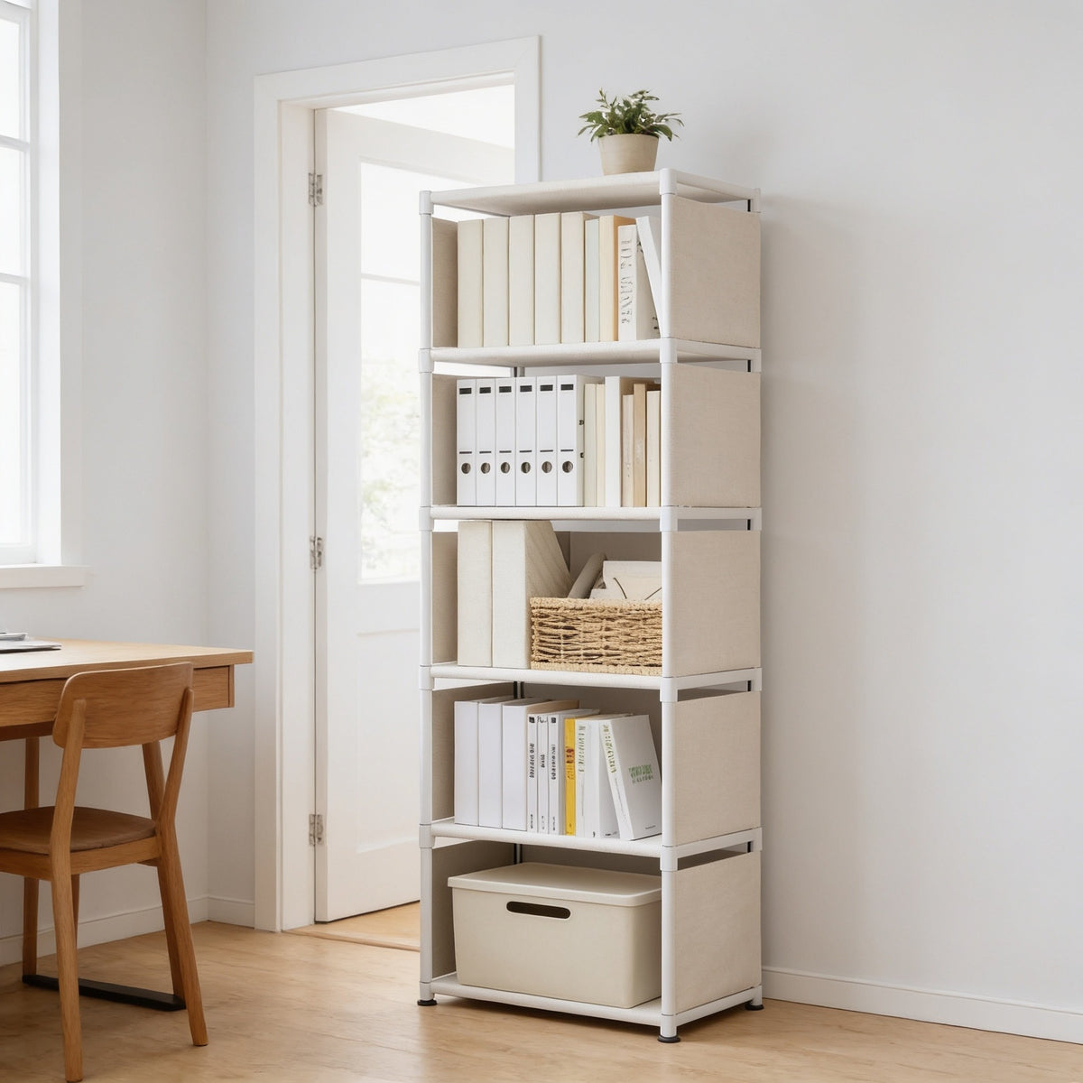White six-tier steel and fabric cube bookshelf with books and baskets beside a desk in a home study.