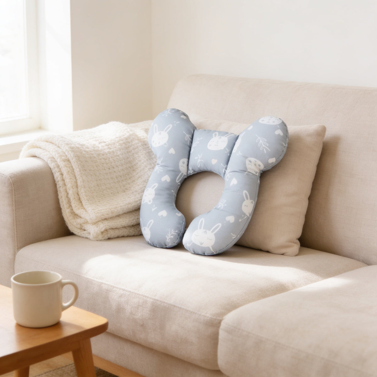 Gray bunny print U-shaped toddler neck pillow.