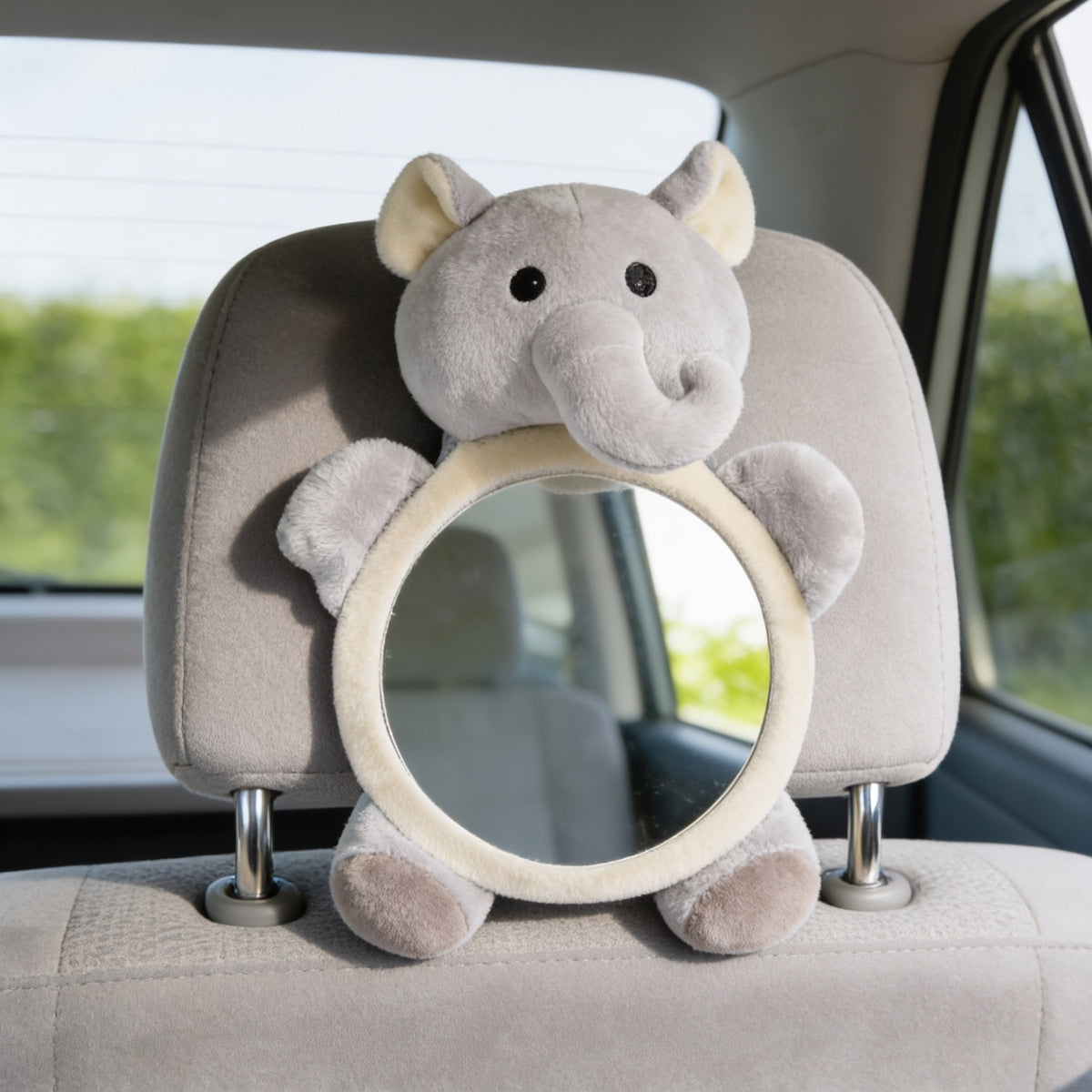Grey plush Elephant design rear-facing baby car mirror on the same empty grey back-seat headrest