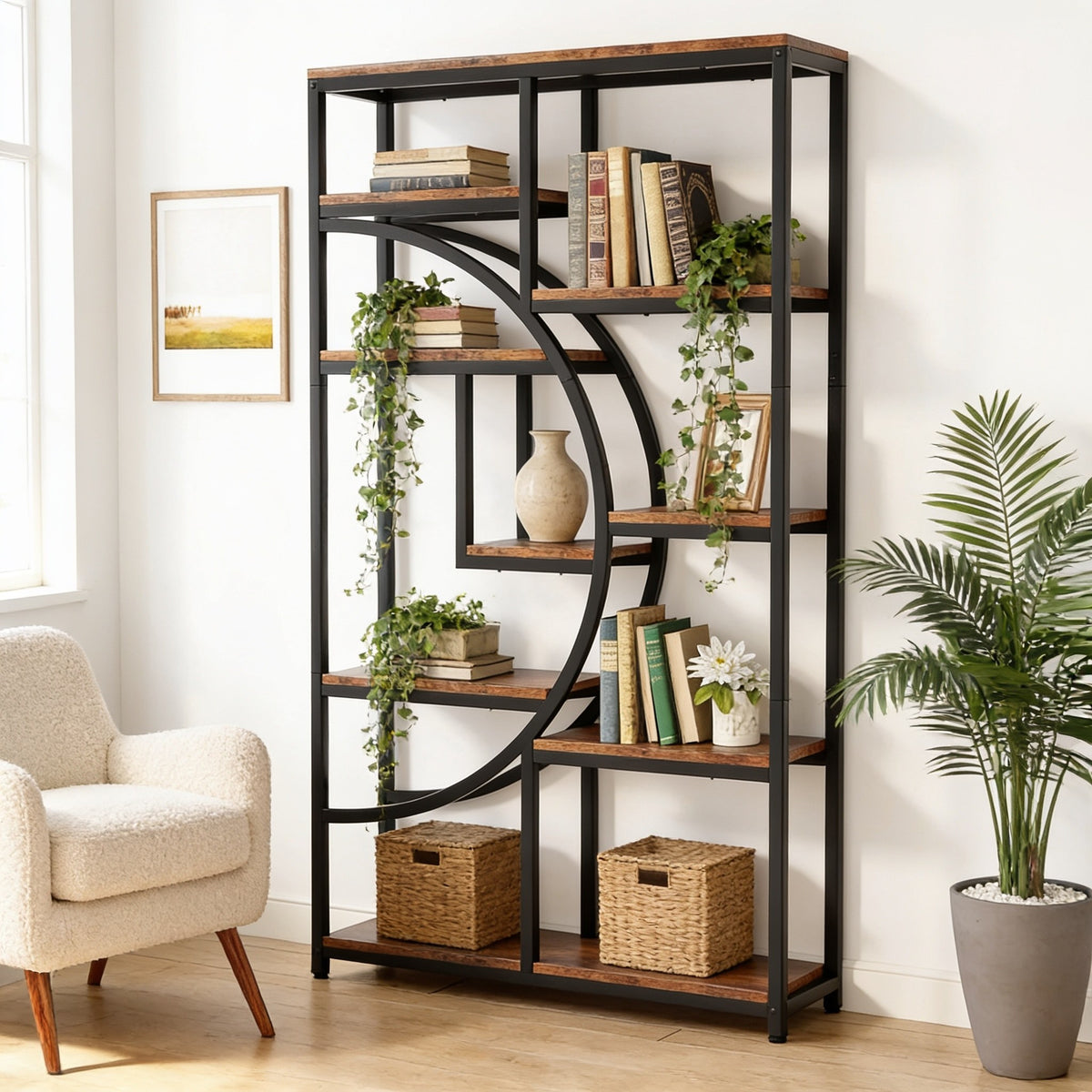 Industrial geometric etagere bookcase with a black iron half-moon arc and rustic brown shelves, styled with books and plants beside an armchair, 175 cm tall.