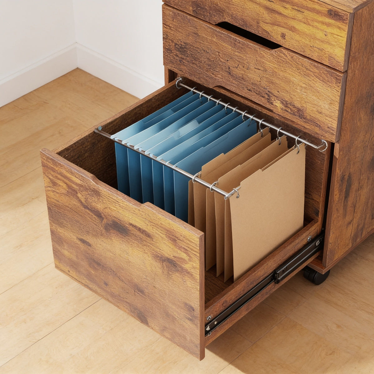 Deep file drawer pulled open with hanging folders on two metal rods.