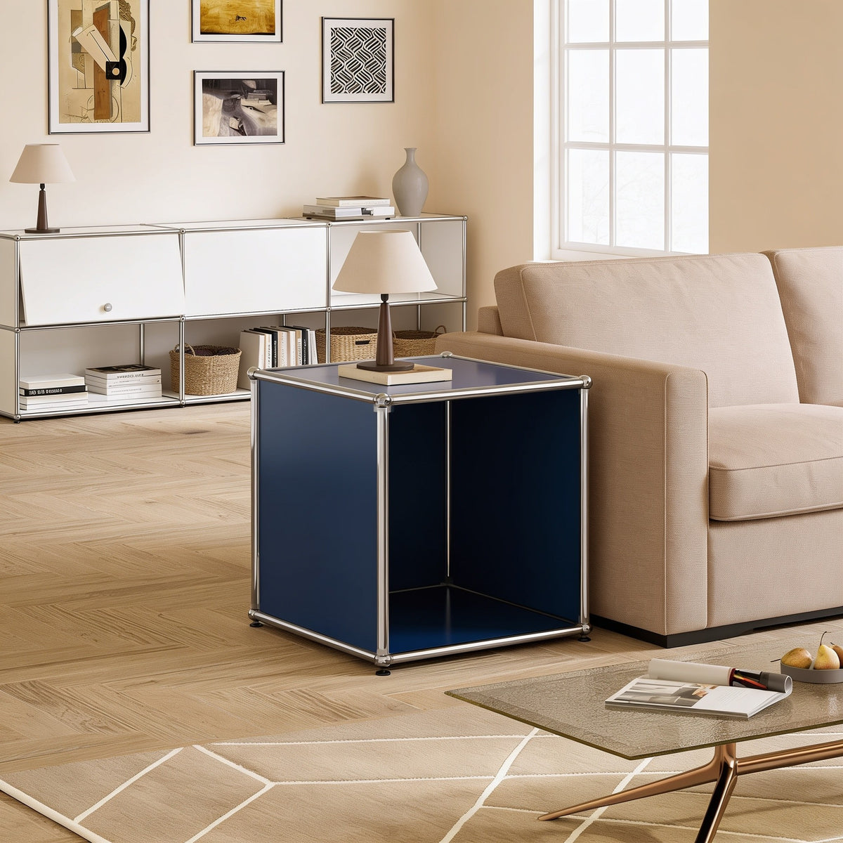 Blue modular metal open cube side table with chrome frame and ball connectors in a living room.