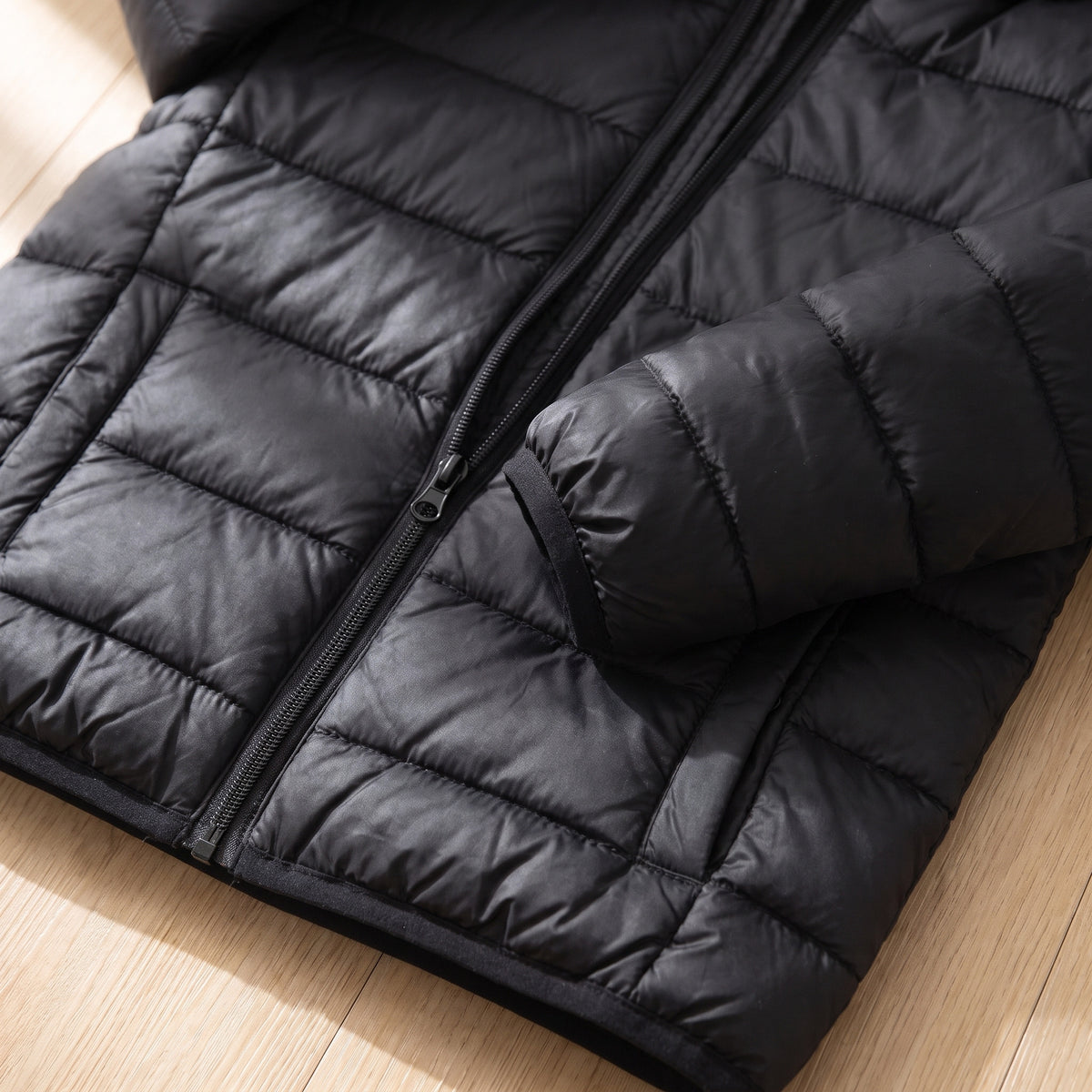 Close-up of the quilted channels and the full-length zip on the jacket