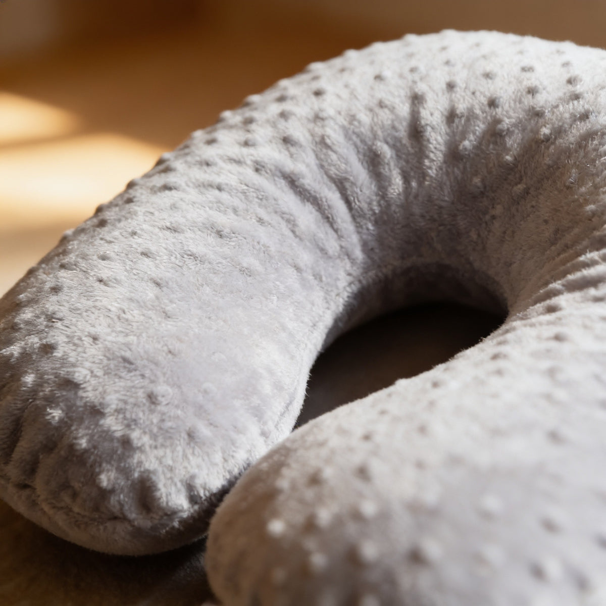 Close detail of the soft raised-dot minky fabric.