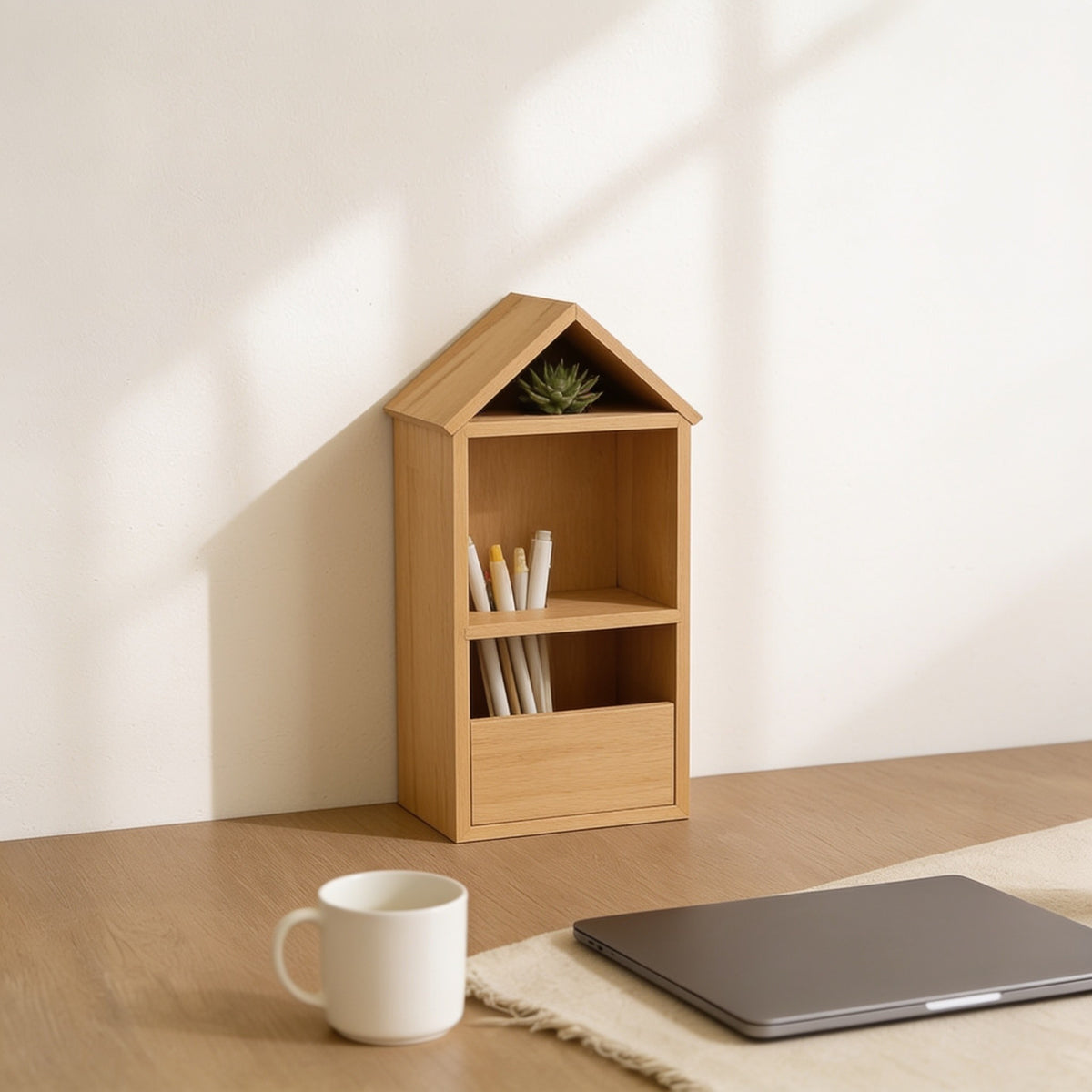 Medium natural wood house-shaped desk shelf on a home-office desk.