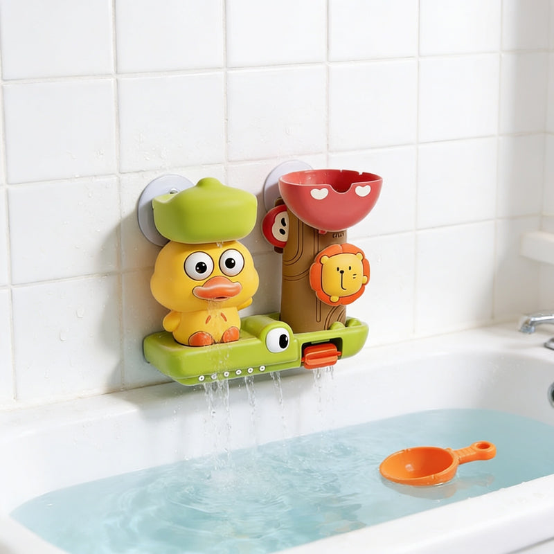 Duck suction-cup bath toy on the tile wall above the tub with water pouring through, orange scoop floating.