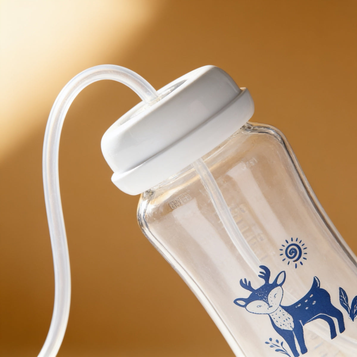Close detail of the bottle's soft tube and valve fitting.