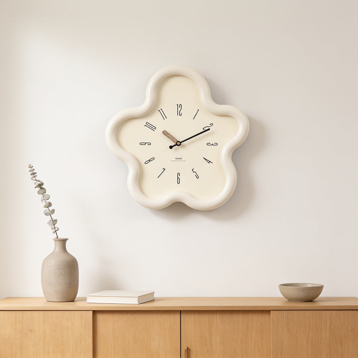 Cream white flower-shaped wall clock above an oak sideboard — Wavy Flower-Shaped Wall Clock