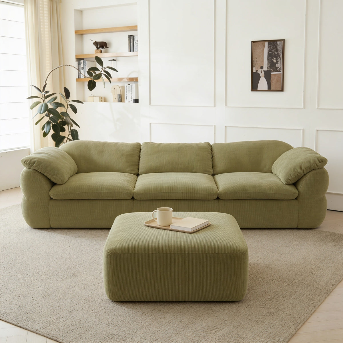 Olive green chenille modular cloud couch with ottoman.